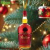 Weller Antique 107 bourbon bottle ornament on a Christmas tree.