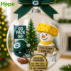 A clear round Green Bay Packers snow globe ornament with a helmet and trophy inside!