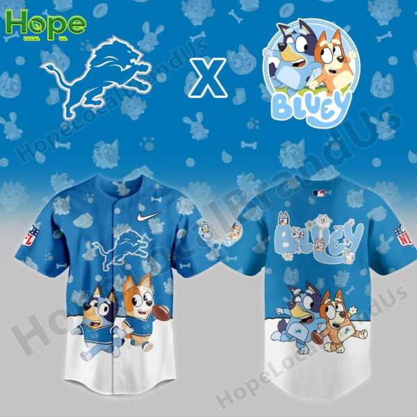 A blue baseball-style jersey featuring Bluey and Bingo along with the Detroit Lions logo. The jersey has a fun, sporty design that blends the NFL team with the animated characters.
