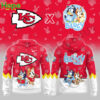 A red hoodie featuring the Kansas City Chiefs logo with Bluey and Bingo characters, along with NFL elements and playful designs.