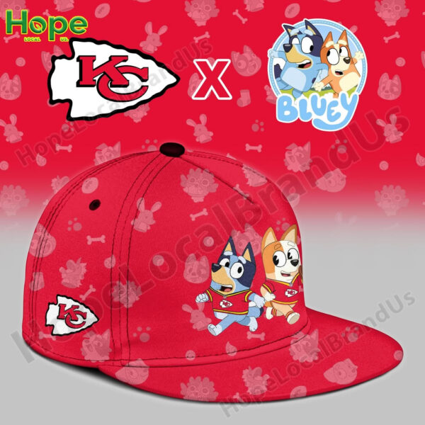 A red cap featuring Kansas City Chiefs logo and Bluey and Bingo characters on the front.
