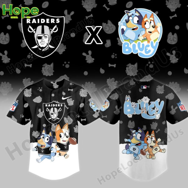 A black baseball jersey with the Las Vegas Raiders logo on the front and Bluey and Bingo running with a football on the back.