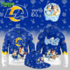 A hoodie with the Los Angeles Rams logo and characters Bluey and Bingo from the animated show Bluey.