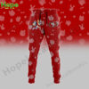 Red joggers with a San Francisco 49ers logo on one leg and Bluey and Bingo characters on the other!