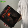 A person is holding the black Lord of the Rings Advent Calendar box that features the Tower of Barad dur and the Eye of Sauron!