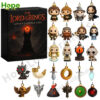 The black Mordor themed Lord of the Rings Advent Calendar box is displayed next to the 24 unique character and item figures from the set!